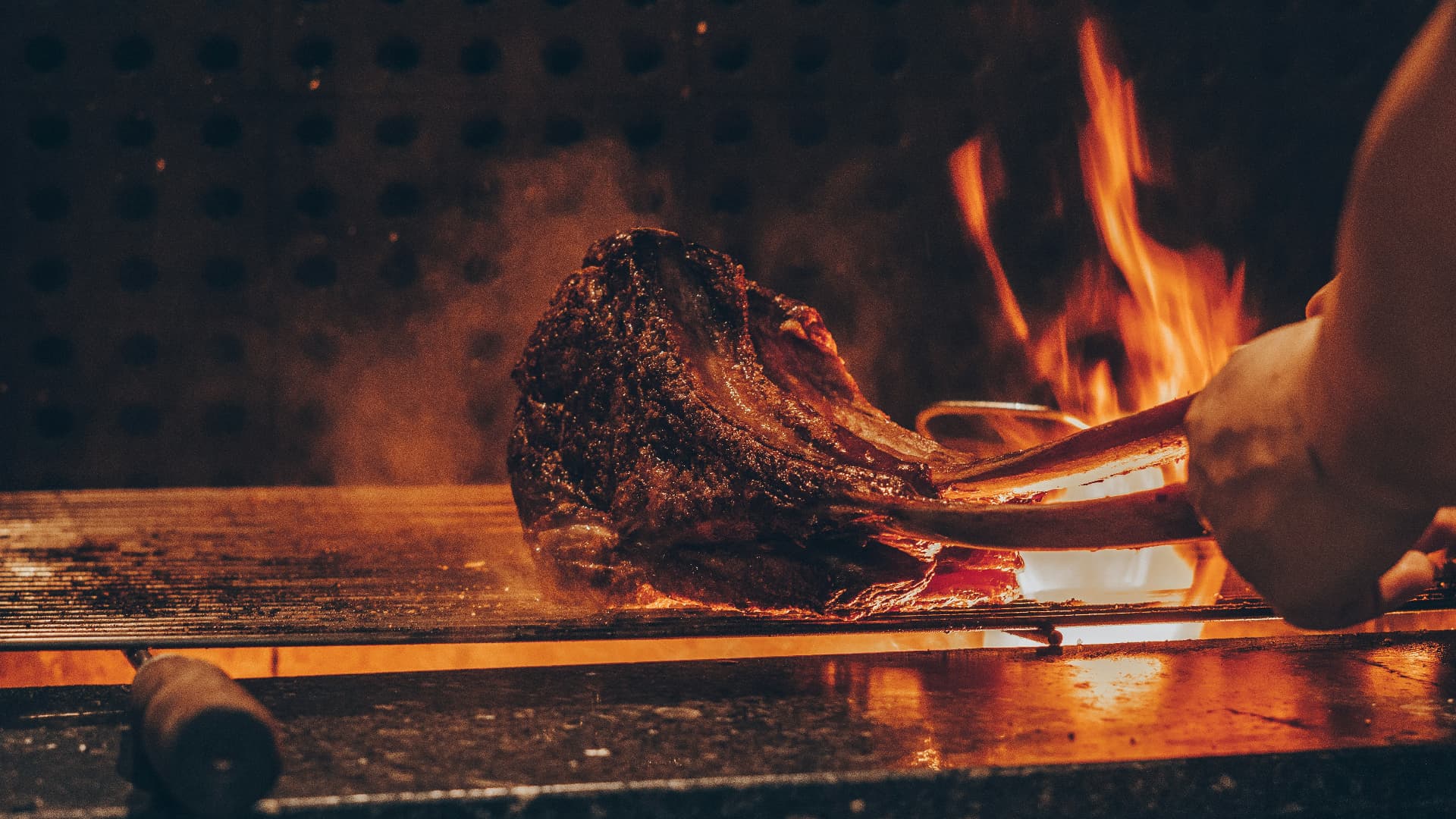 Meat cooking close over open flame